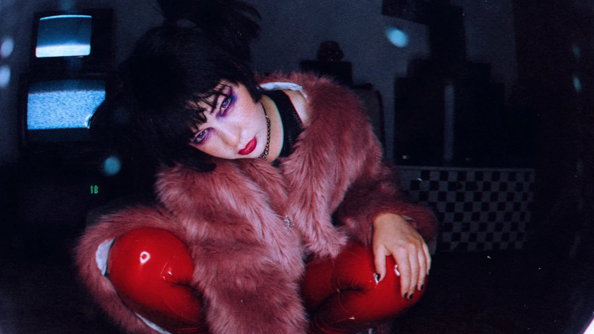 Demo32 A Woman In A Fur Coat And Red Gloves