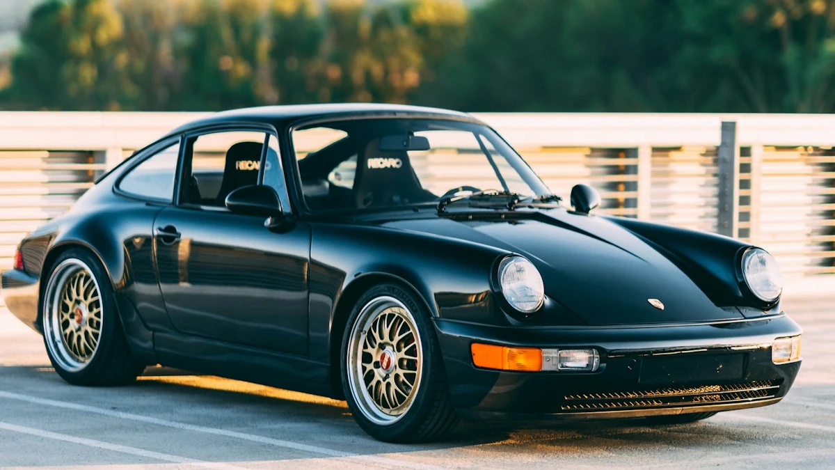 Demo34 A Black Sports Car Parked In A Parking Lot